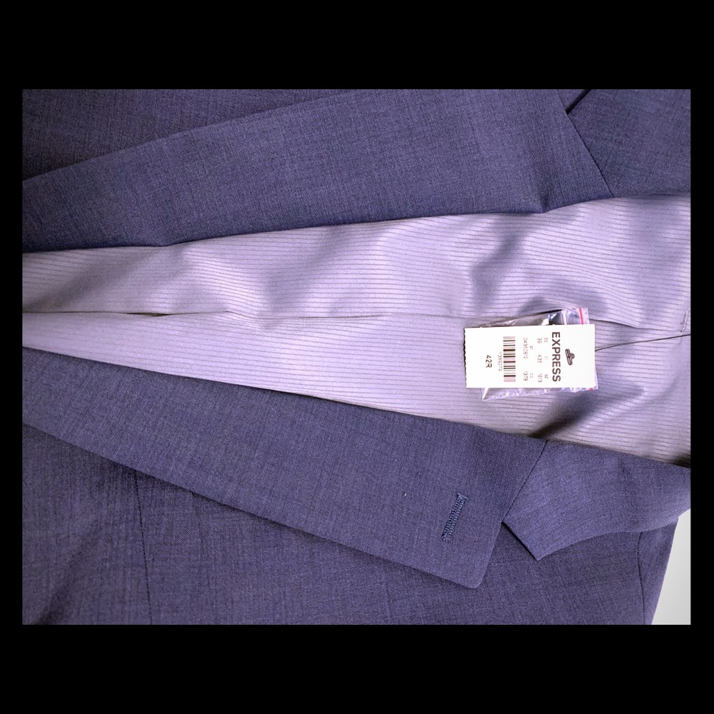 Selling new with tags suit jacket and pants.